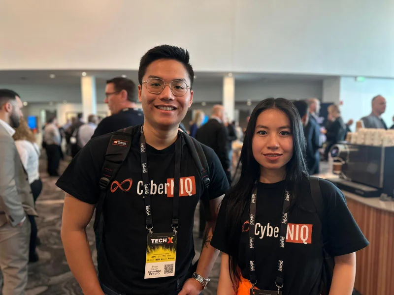 Huu and Hoang in CyberNIQ shirts at Dicker Data TechX 2024