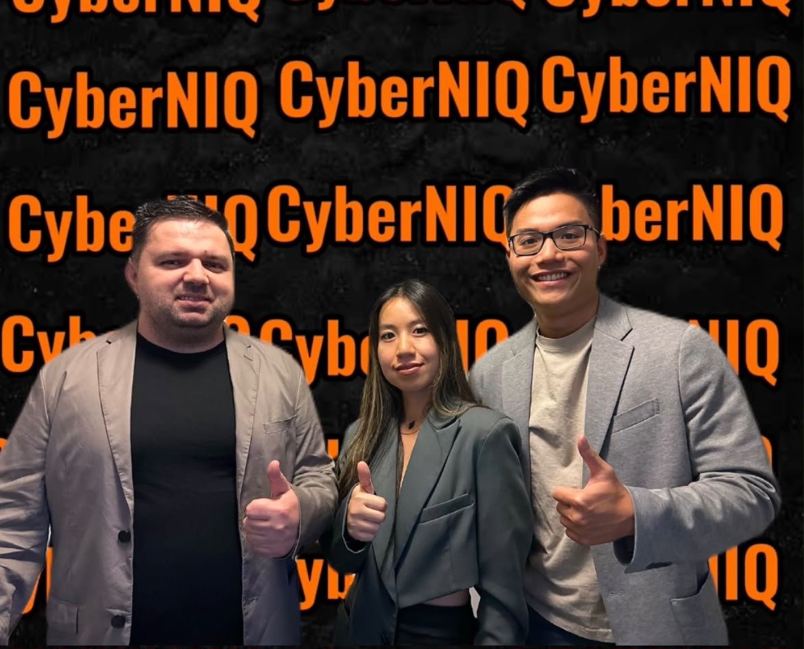 The CyberNIQ team giving a thumbs up